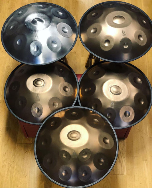 many handpans, arranged